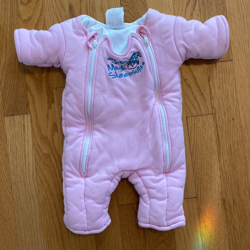 Pink Baby Merlin Magic Sleepsuit. Size small.
